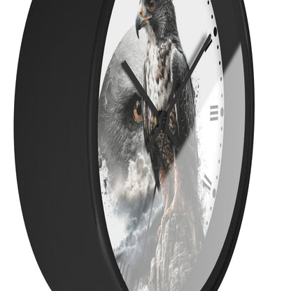 A round wall clock with a black frame and a white face featuring a detailed graphic print of a hawk and owl in grayscale and earthy tones.