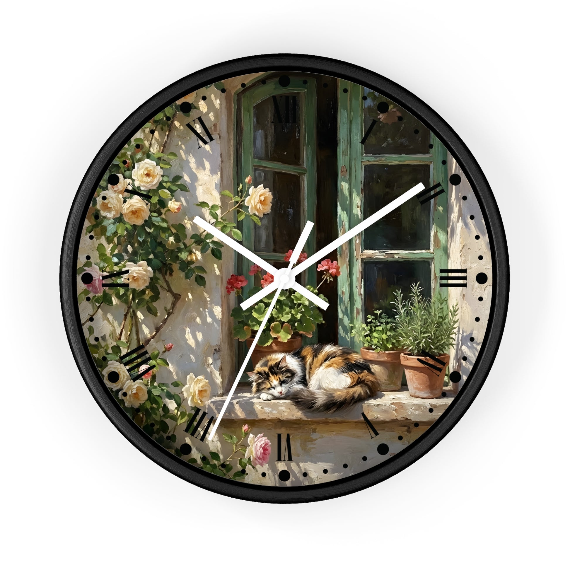 Round wall clock with a black frame and a printed scene of a cat resting on a windowsill beside climbing roses and potted plants, shown against a plain white background.