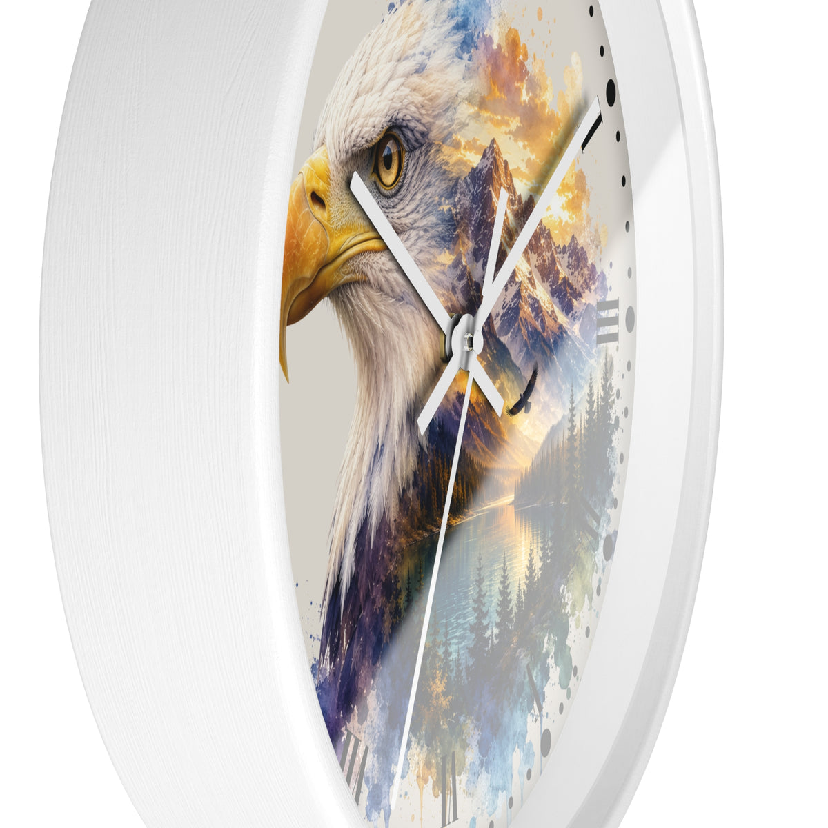 A white oval wall clock featuring a detailed print of a bald eagle's head with a colorful landscape of mountains and trees overlaid on the face.