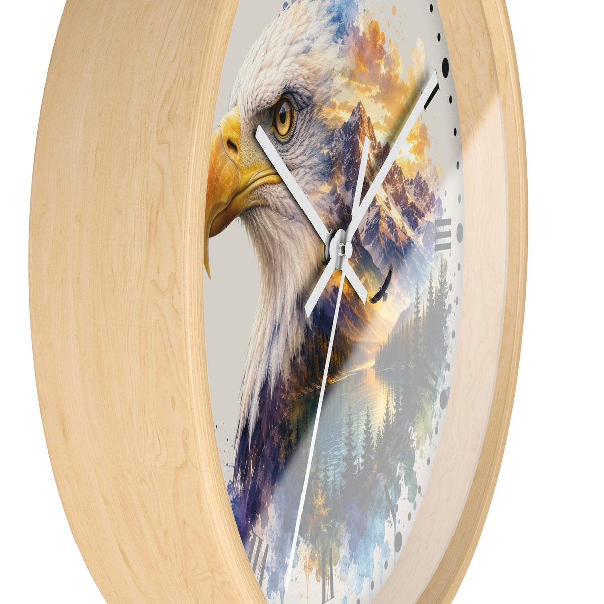 Round wall clock with a light natural wood frame and a printed design of a bald eagle over a mountain and forest scene, shown on a white background.