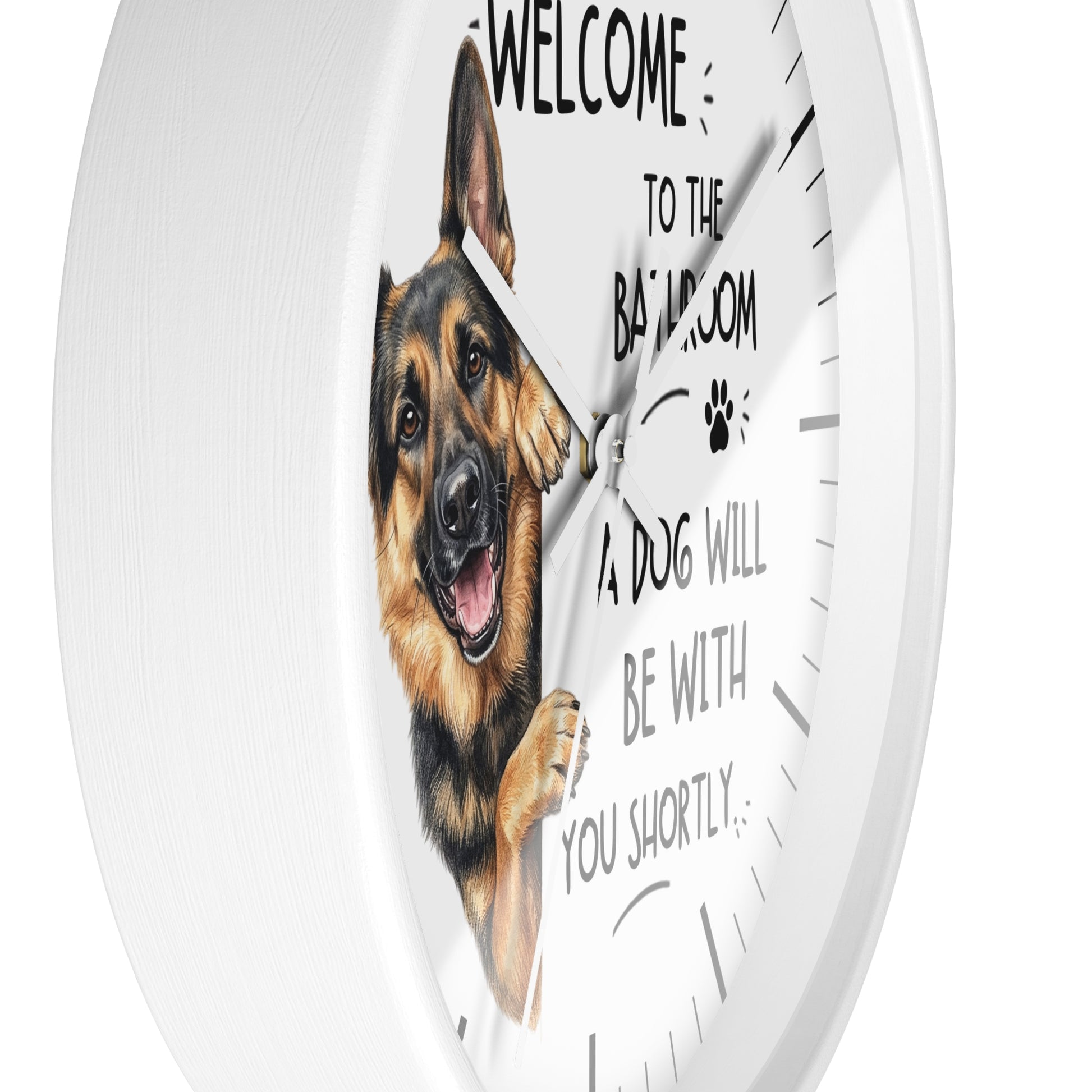 A round white wall clock with a printed German Shepherd illustration and the text 'WELCOME TO THE BATHROOM ROOM A DOG WILL BE WITH YOU SHORTLY.