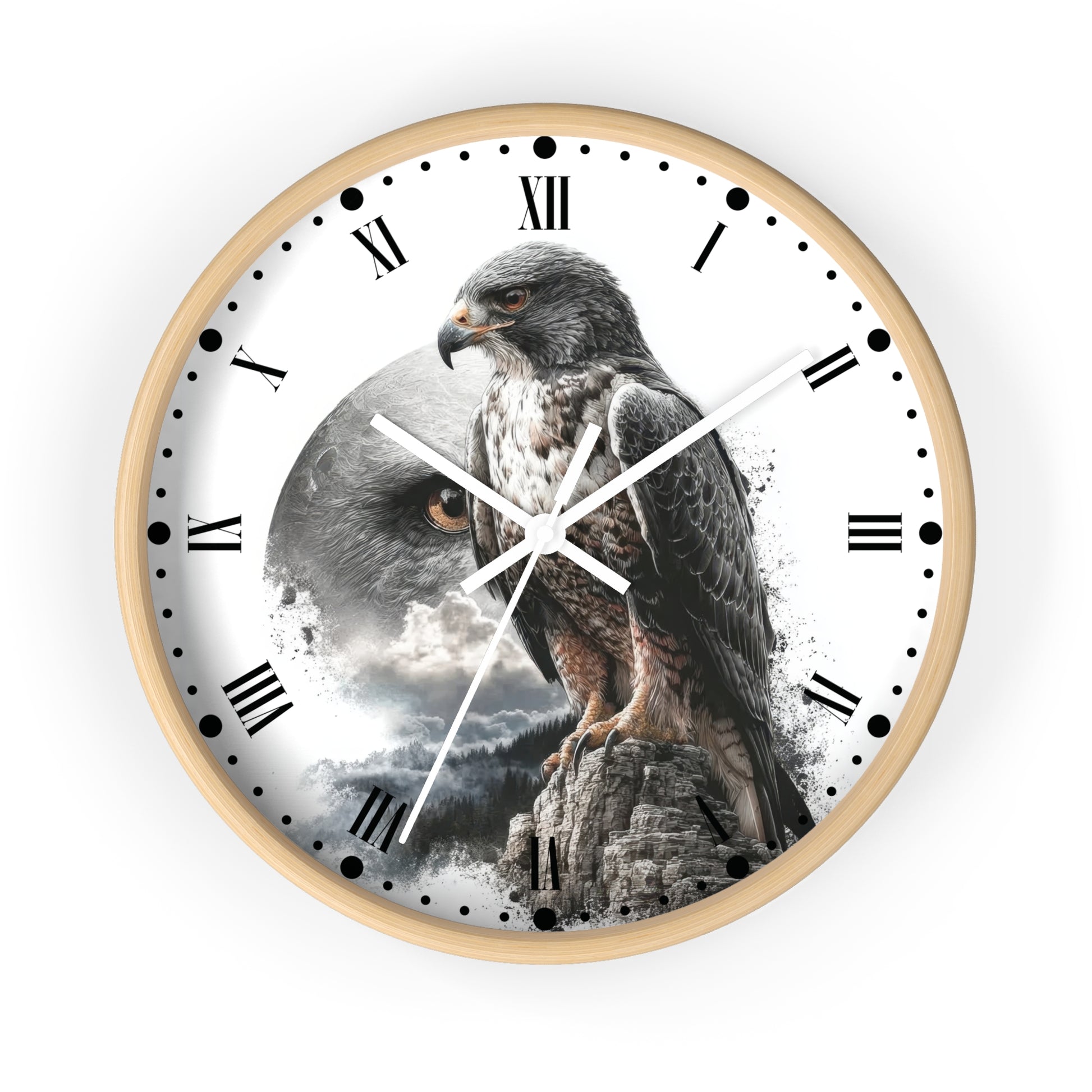 A round wall clock with a light wood frame and a white face featuring a large eagle perched on a rock, with a cloudy sky and mountain background. The clock has black Roman numerals, black minute markers with dots, and white hands.