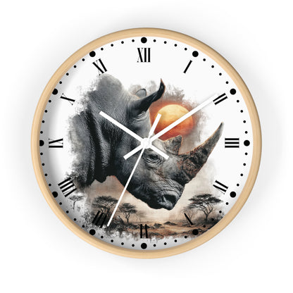 A round wall clock with a light wood frame and a white face featuring a large rhinoceros illustration, Roman numerals, black hour markers, white hands, and a small orange sun over a savanna scene.
