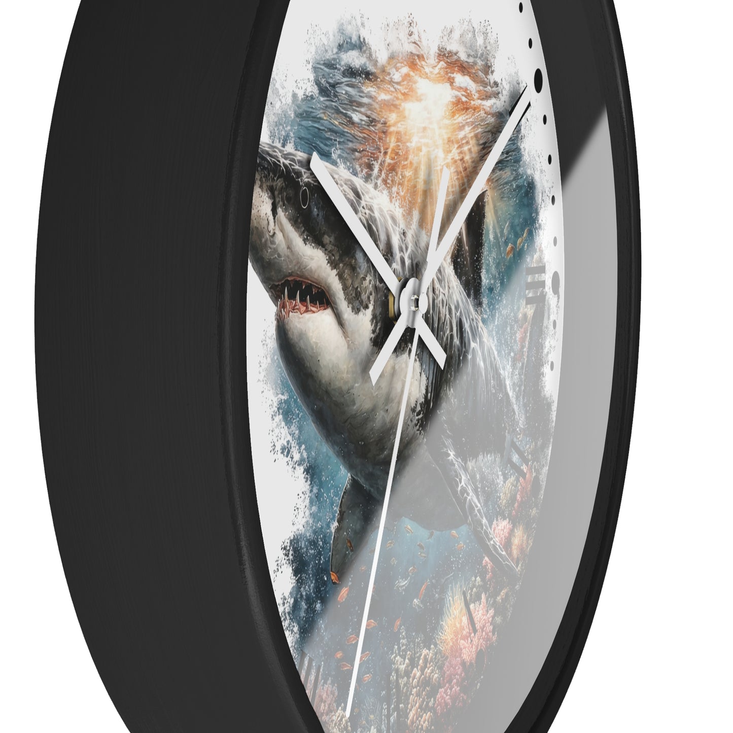 A round wall clock with a black frame and a printed shark design on the face, photographed against a plain white background.