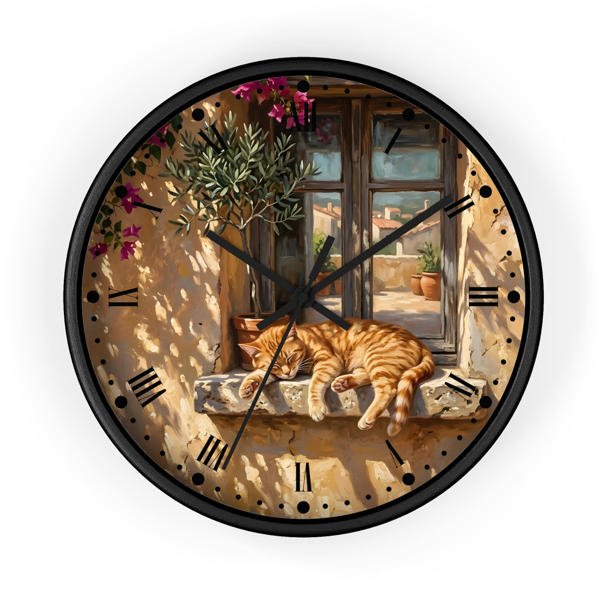 Round wall clock with a black frame and a printed scene of an orange tabby cat sleeping on a stone windowsill beside a Mediterranean-style window, olive tree, and pink flowers. Roman numerals mark the hours.