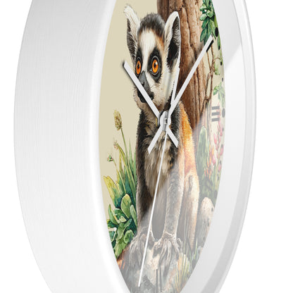 Round white wall clock featuring a detailed illustration of a ring-tailed lemur on the clock face, with white hands and a clean white frame.