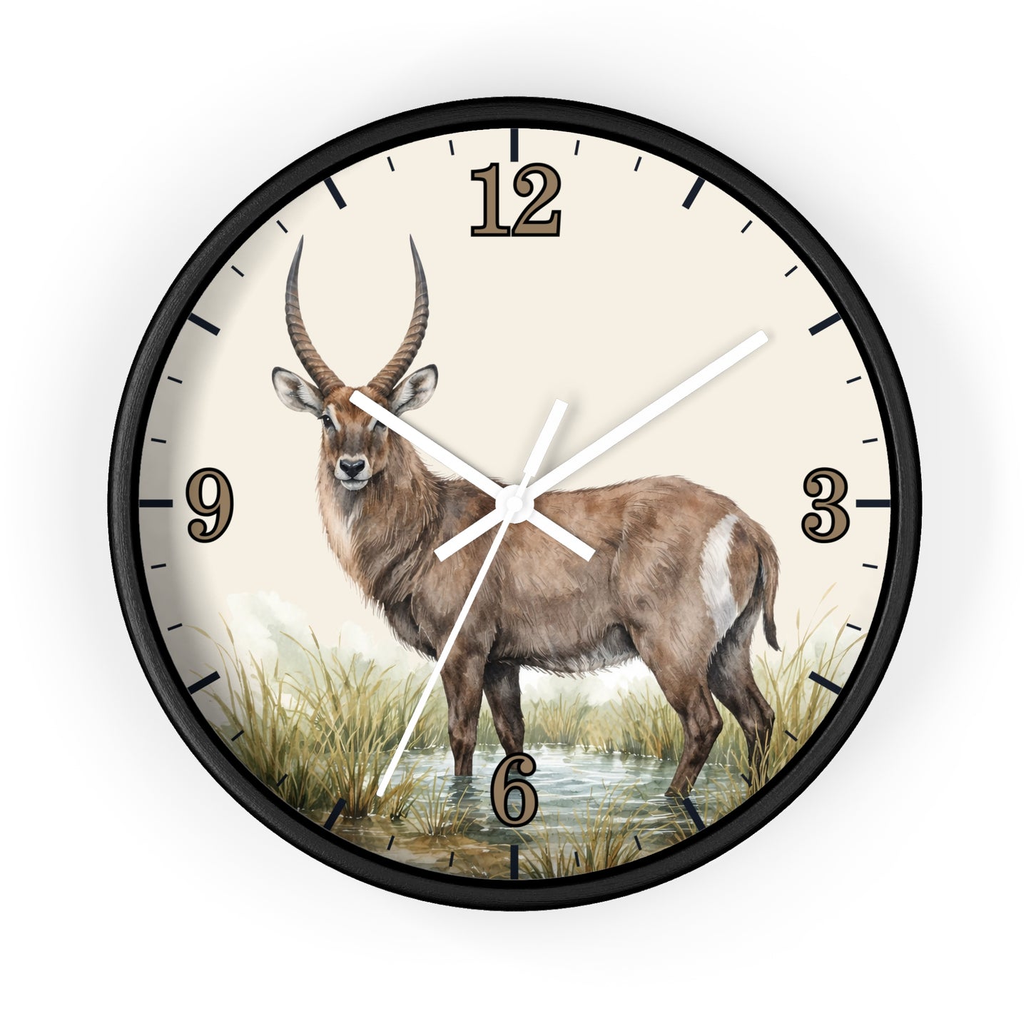 A round wall clock with a black frame and a cream-colored face featuring a painted antelope standing in grassy water. The clock has black Arabic numerals and white hands.