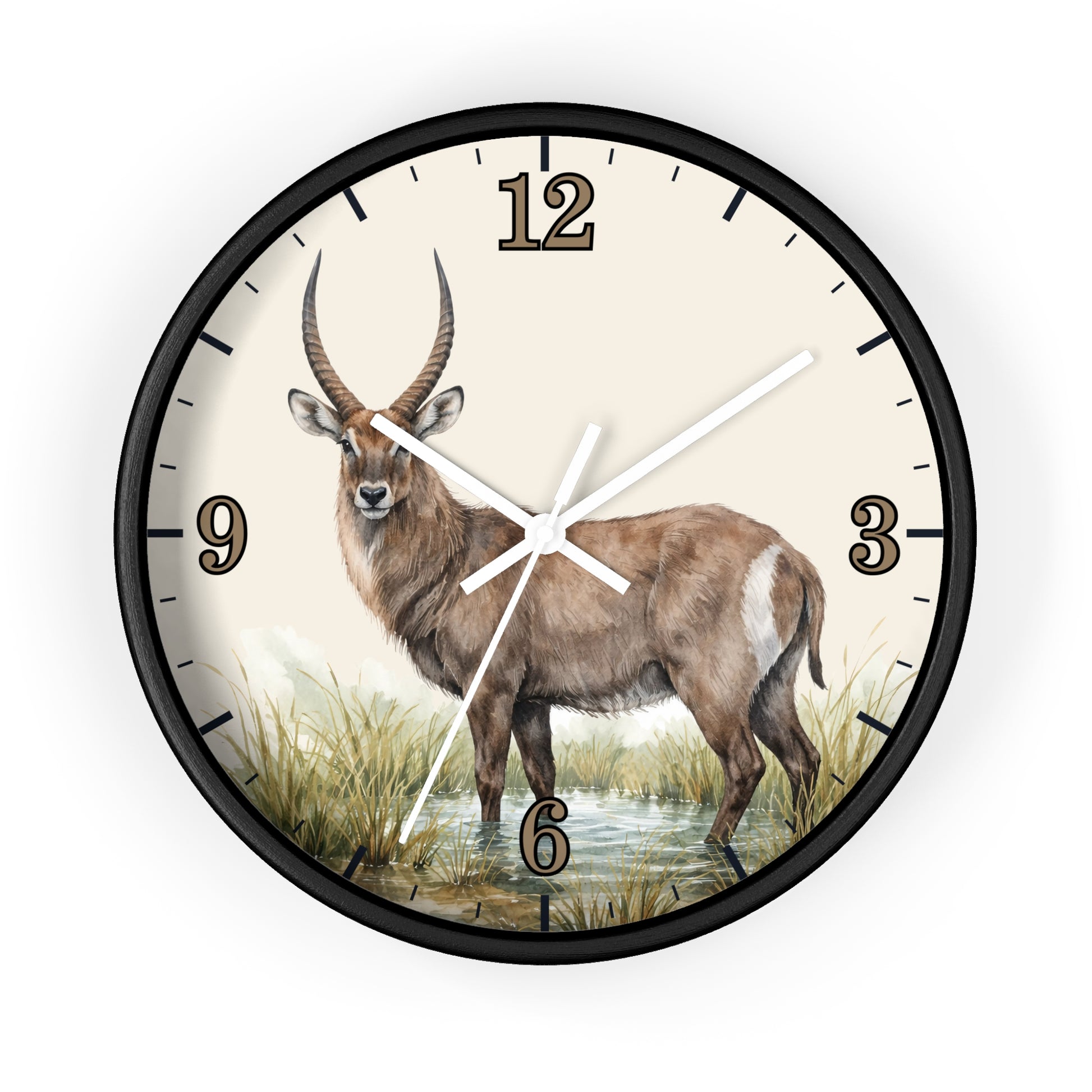 A round wall clock with a black frame and a cream-colored face featuring a painted antelope standing in grassy water. The clock has black Arabic numerals and white hands.