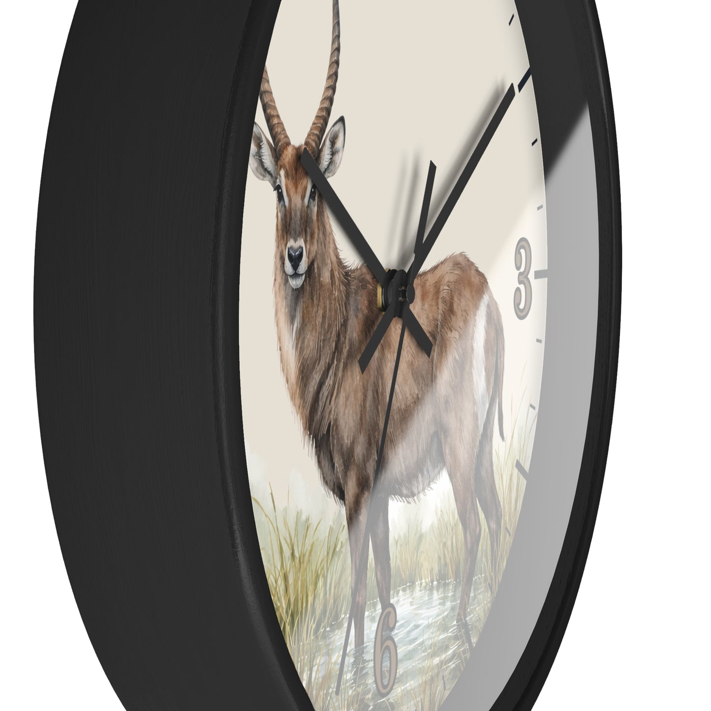 A round wall clock with a black frame and a printed natural history-style illustration of a brown antelope on the face, with black hands and small gray numerals.