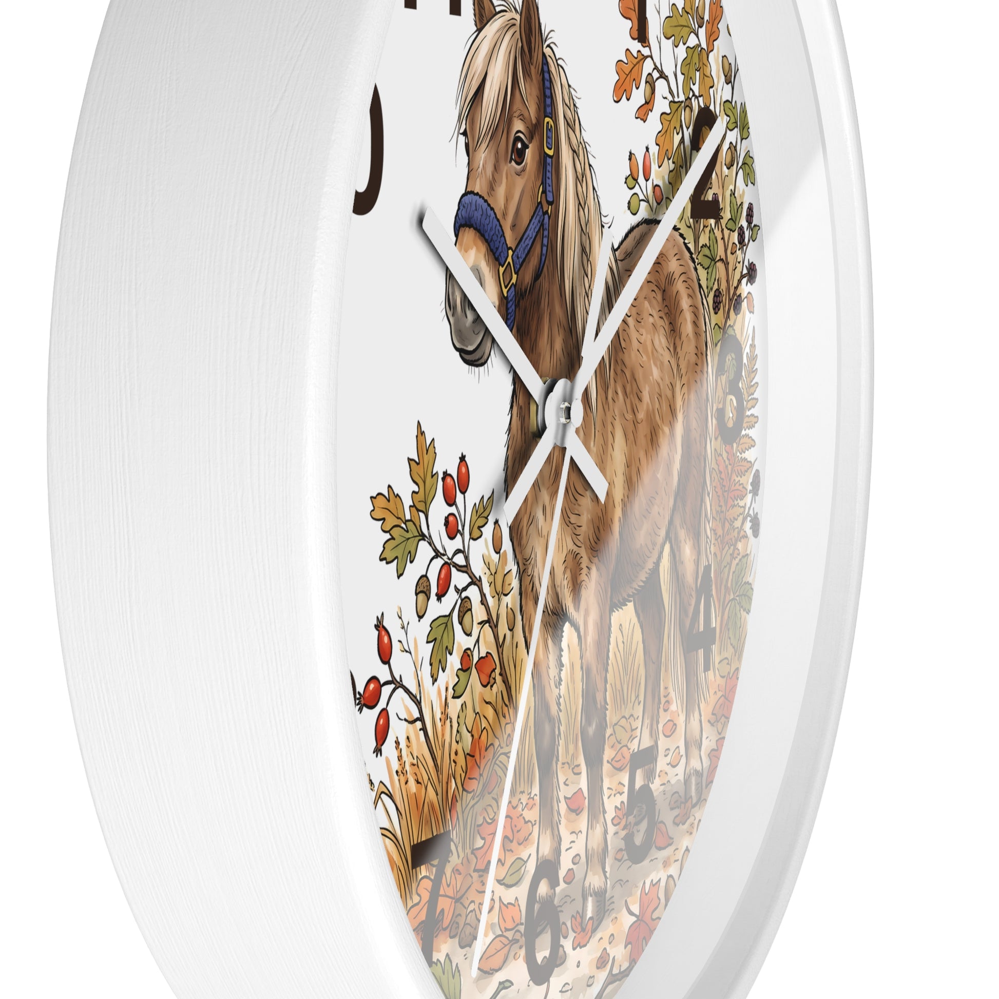Round white wall clock featuring a printed illustration of a brown horse with a blue halter and autumn foliage on the face.