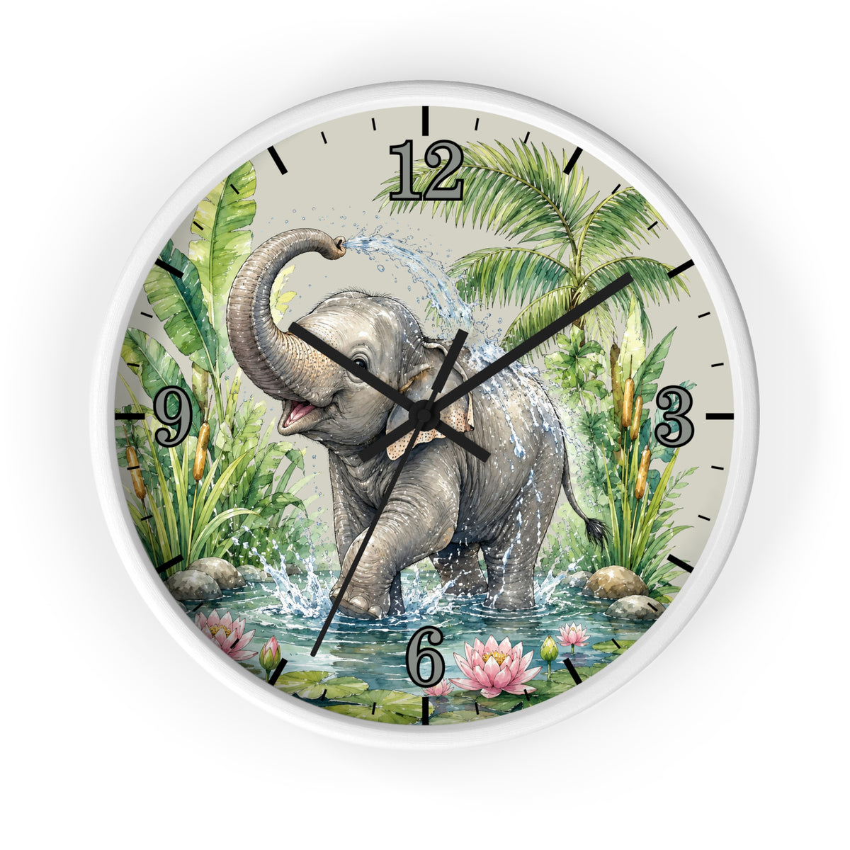 A round wall clock with a white frame and a printed illustration of a playful gray elephant standing in shallow water, surrounded by tropical green foliage, palm leaves, pink flowers, and black Arabic numerals on a light beige clock face.
