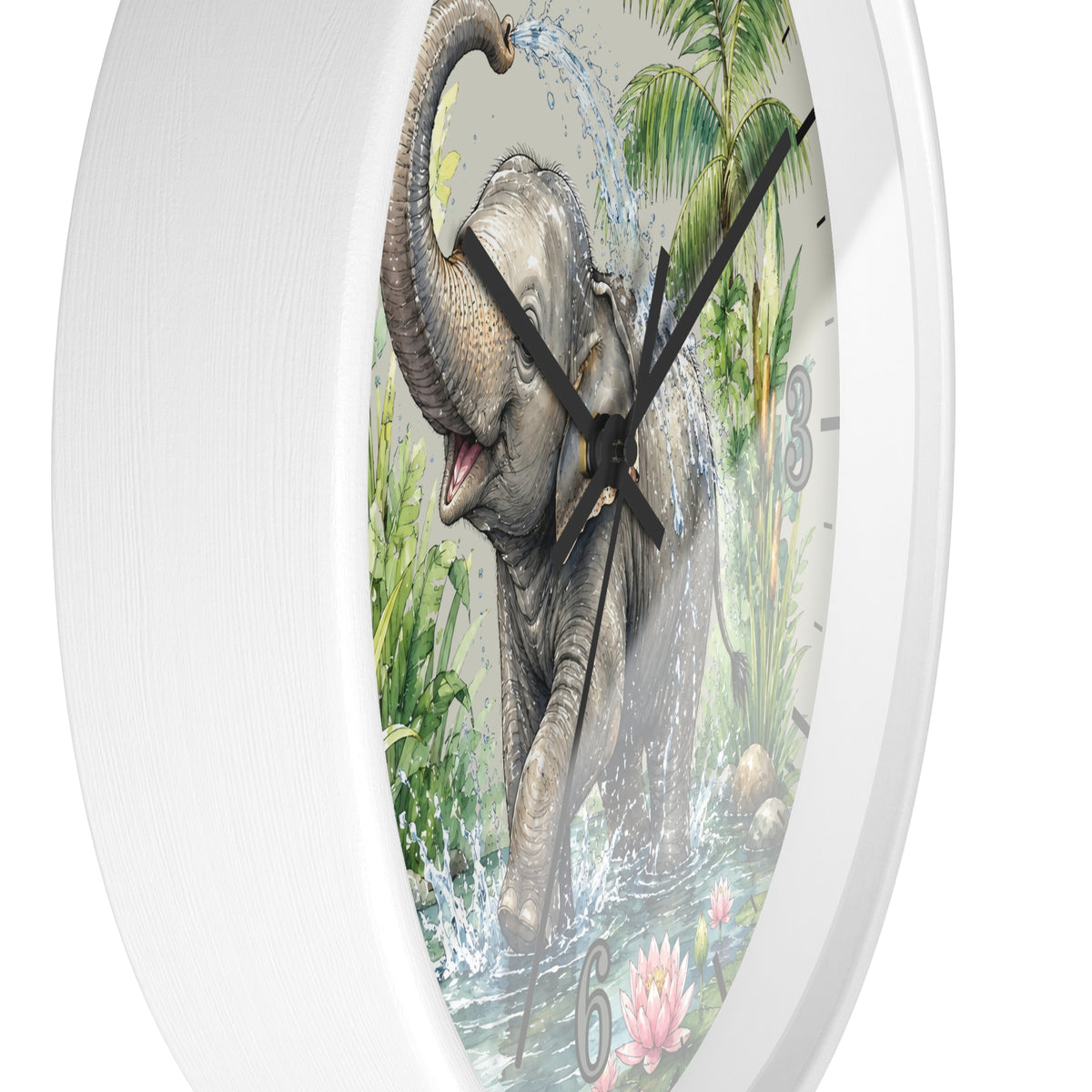 A round wall clock with a white frame and a printed illustration of an elephant spraying water in a tropical jungle scene. The clock has black hands and partial black Arabic numerals on the face.