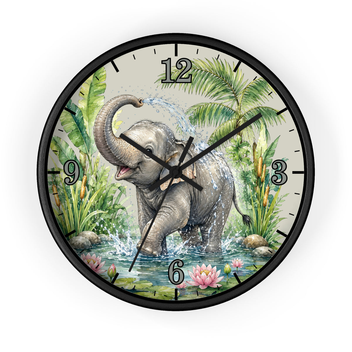 A round wall clock with a black frame and a detailed illustration of a gray elephant spraying water from a tropical jungle scene, featuring palm trees, lily pads, and pink flowers on the clock face.