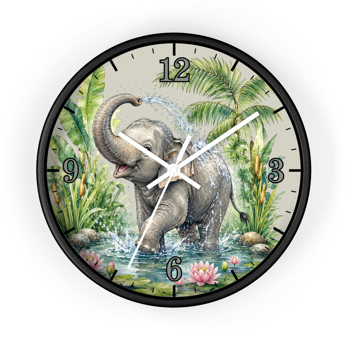 A round wall clock with a black frame and a printed illustration of a gray elephant standing in shallow water, surrounded by tropical green foliage, palm leaves, pink flowers, and white clock hands on a light beige dial.