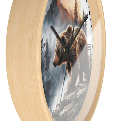 Round wall clock with a light natural wood frame and a printed scenic face showing a brown bear standing on a rocky cliffside in a misty forest landscape. Black clock hands and small black hour markers are visible against a plain white background.