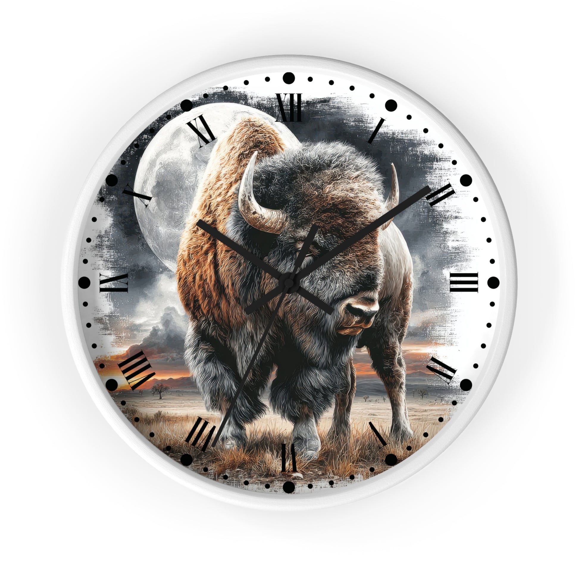A round wall clock with a white frame and a printed design of a bison walking in front of a large moon and smoky sky. The clock face has black Roman numerals, black hour and minute markers, and black hands.
