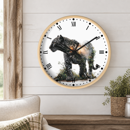 A round wall clock with a light wood frame hangs on a white shiplap wall above a wooden console table. The clock face is white with black Roman numerals and a printed image of a spotted big cat standing on grass.