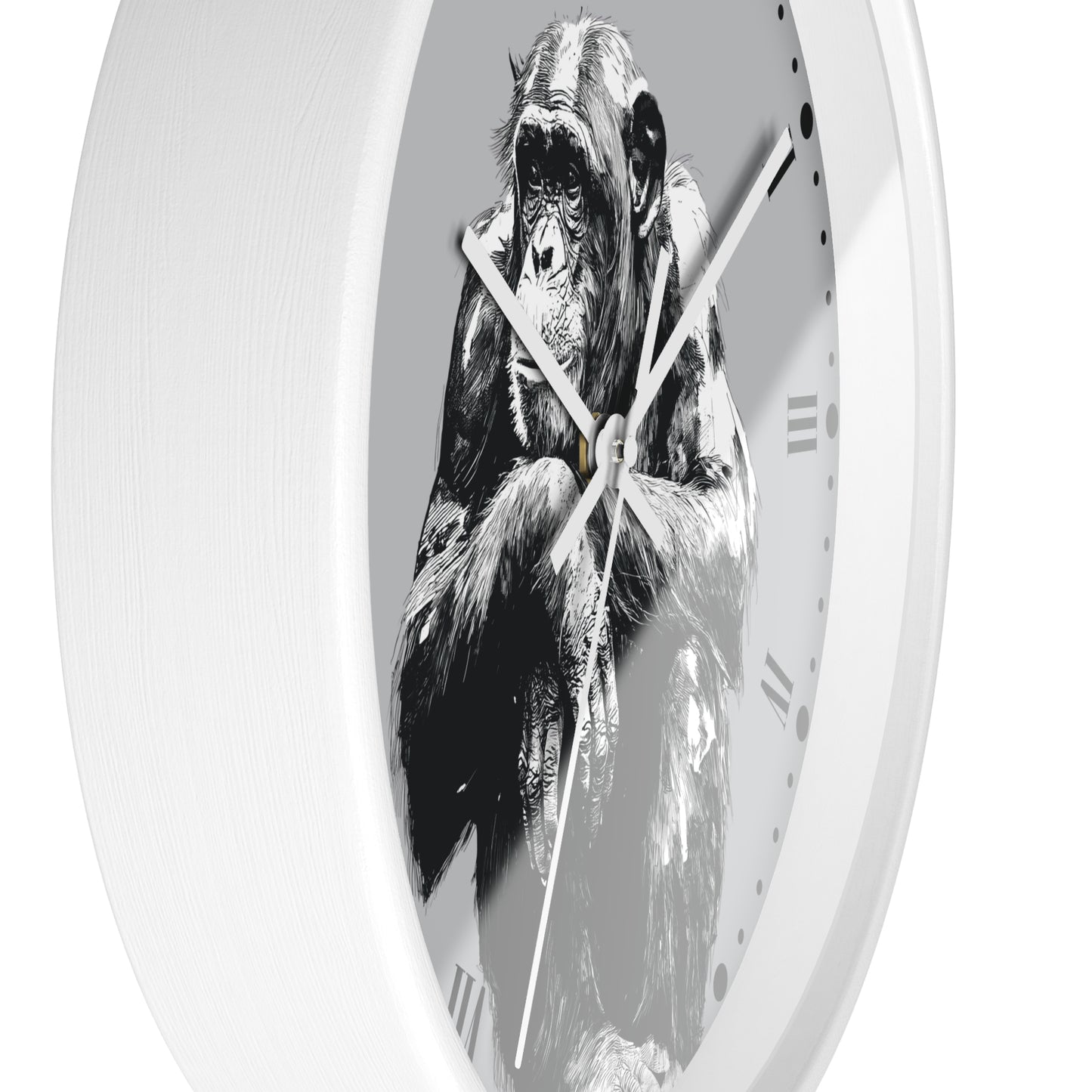 A white round wall clock featuring a black and white illustration of a chimpanzee on the face, with slim white hands and Roman numerals.