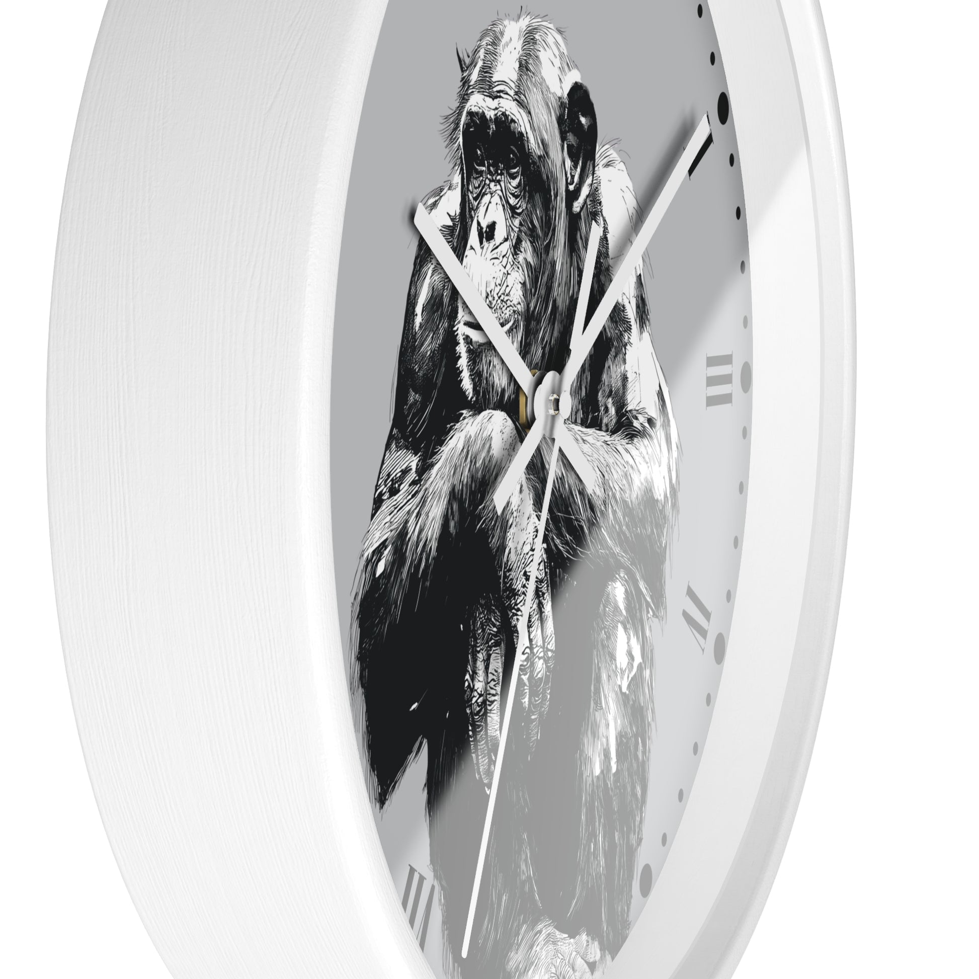 A white round wall clock featuring a black and white illustration of a chimpanzee on the face, with slim white hands and Roman numerals.