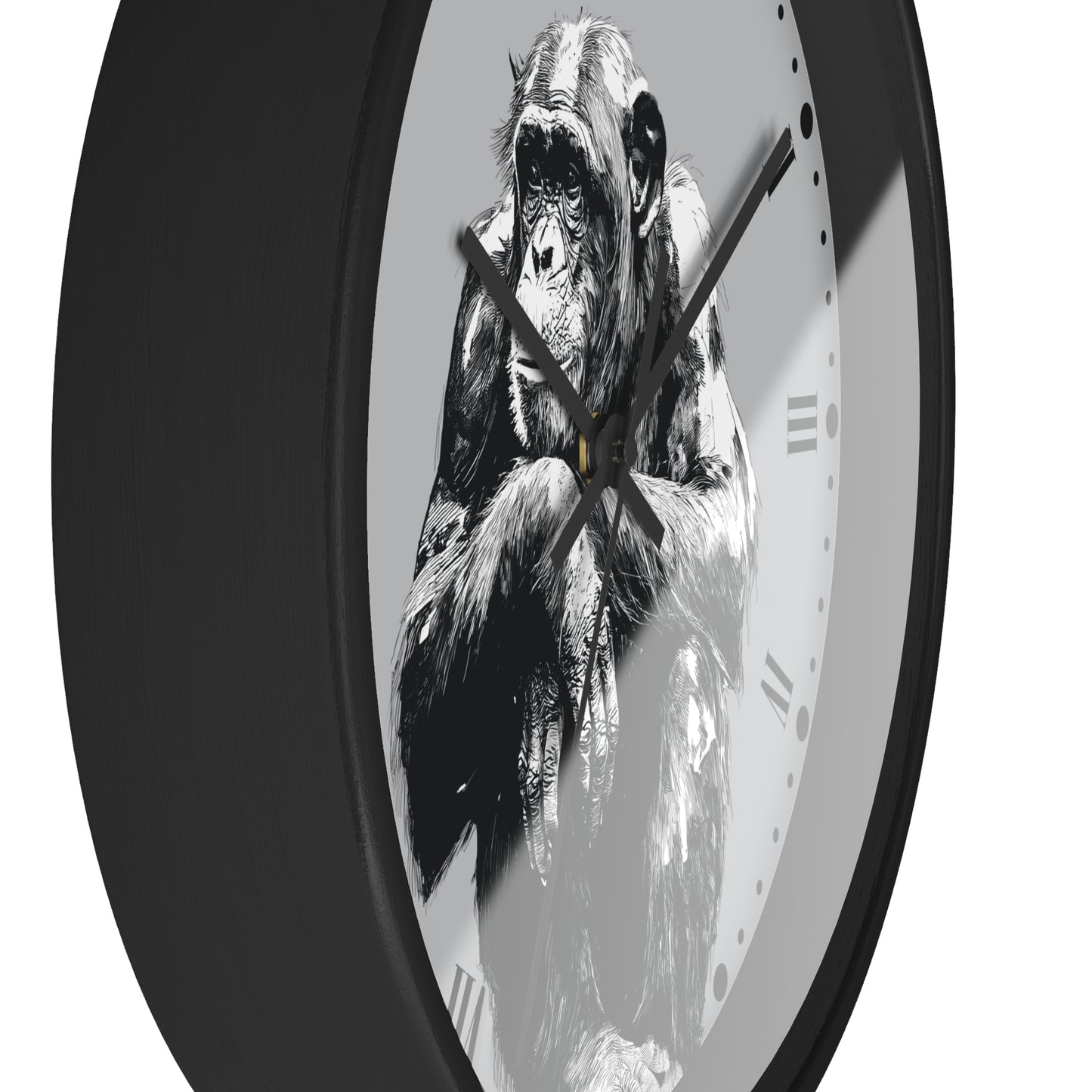 A round wall clock with a black frame and a monochrome illustration of a gorilla on the face, set against a plain white background.