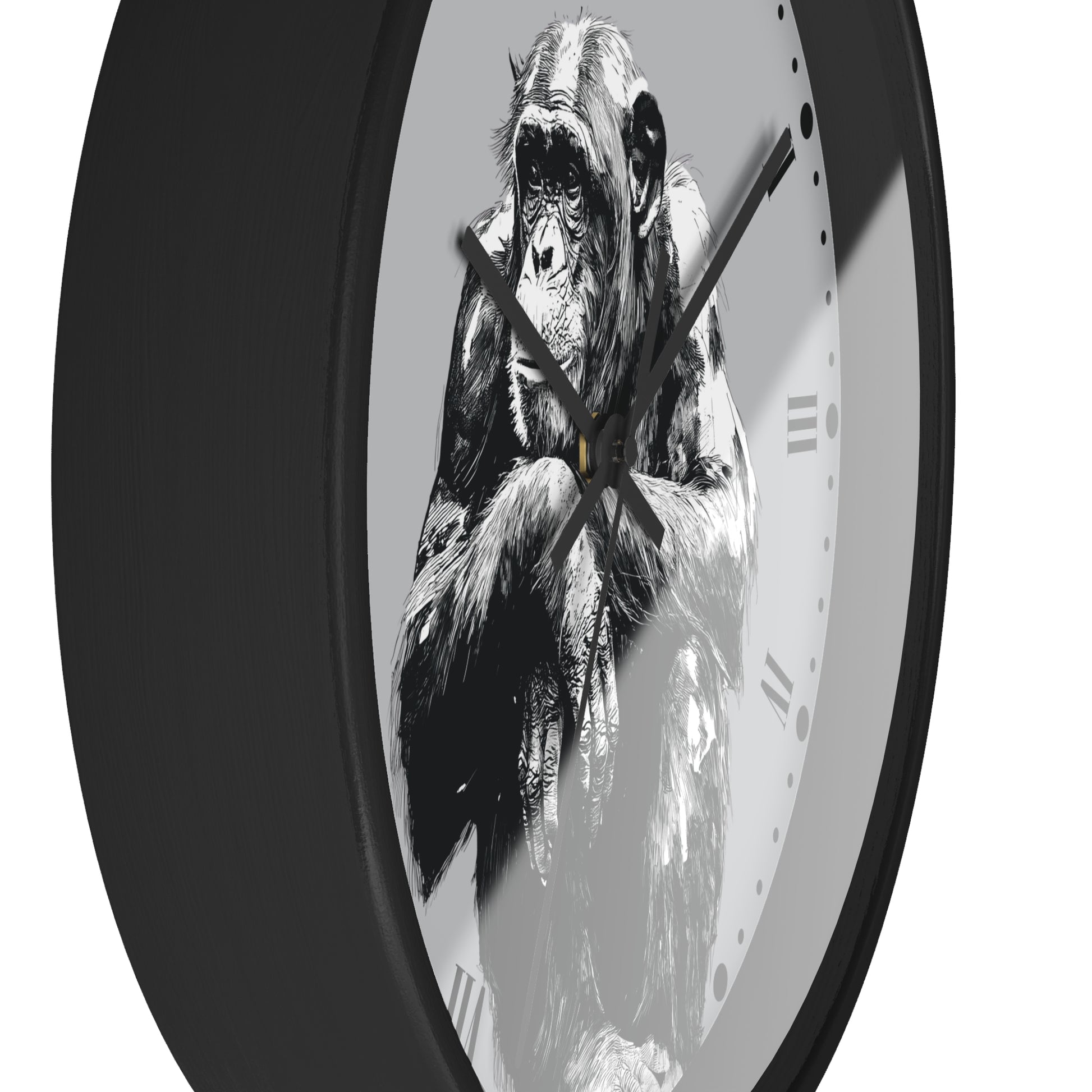 A round wall clock with a black frame and a monochrome illustration of a gorilla on the face, set against a plain white background.