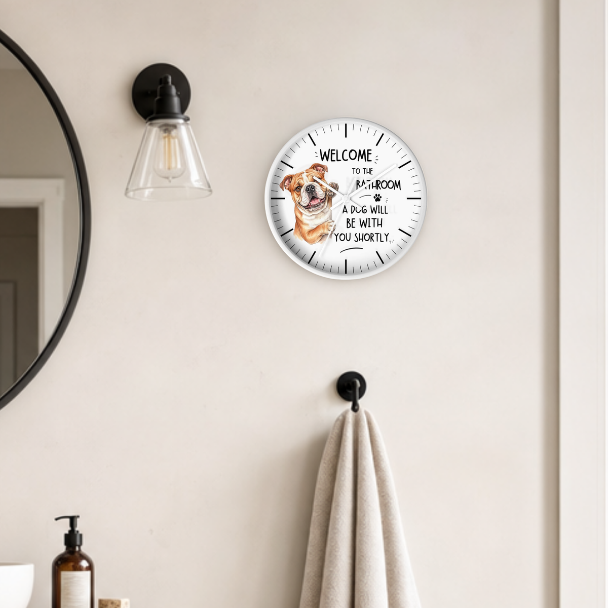 A round wall clock with a white face and black text reading 'WELCOME TO YOUR BOTTLEJAM A DOG WILL BE WITH YOU LATER.