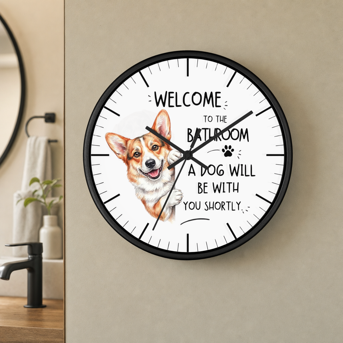 Round black frame clock with a corgi illustration, black hands, and text " Welcome To The Bathroom A Dog Will Be With You Shortly"