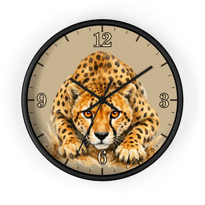 Round wall clock with a black frame and a printed cheetah illustration on the face, with black hour markers and black hands on a light beige background.