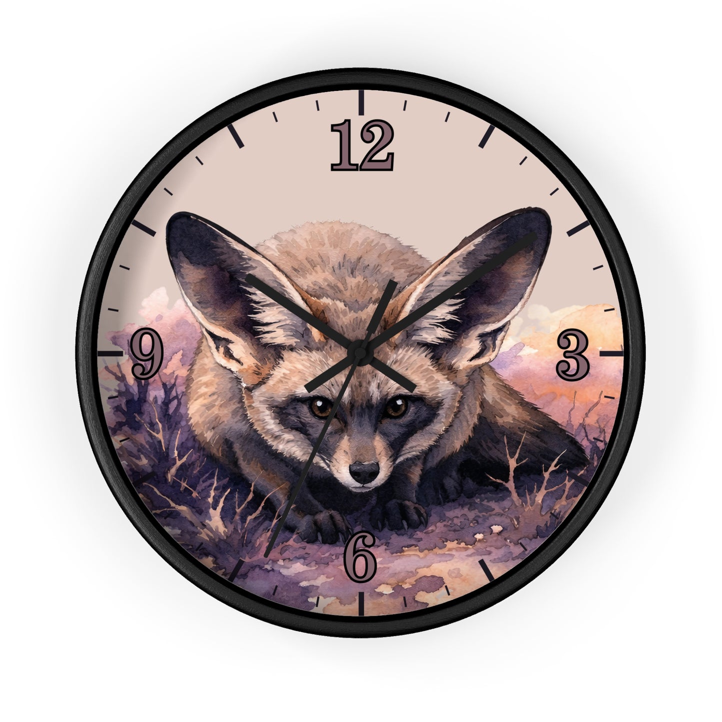 Round wall clock with a black frame and a printed illustration of a large-eared fox on the face, with black numerals and hands on a light beige background.