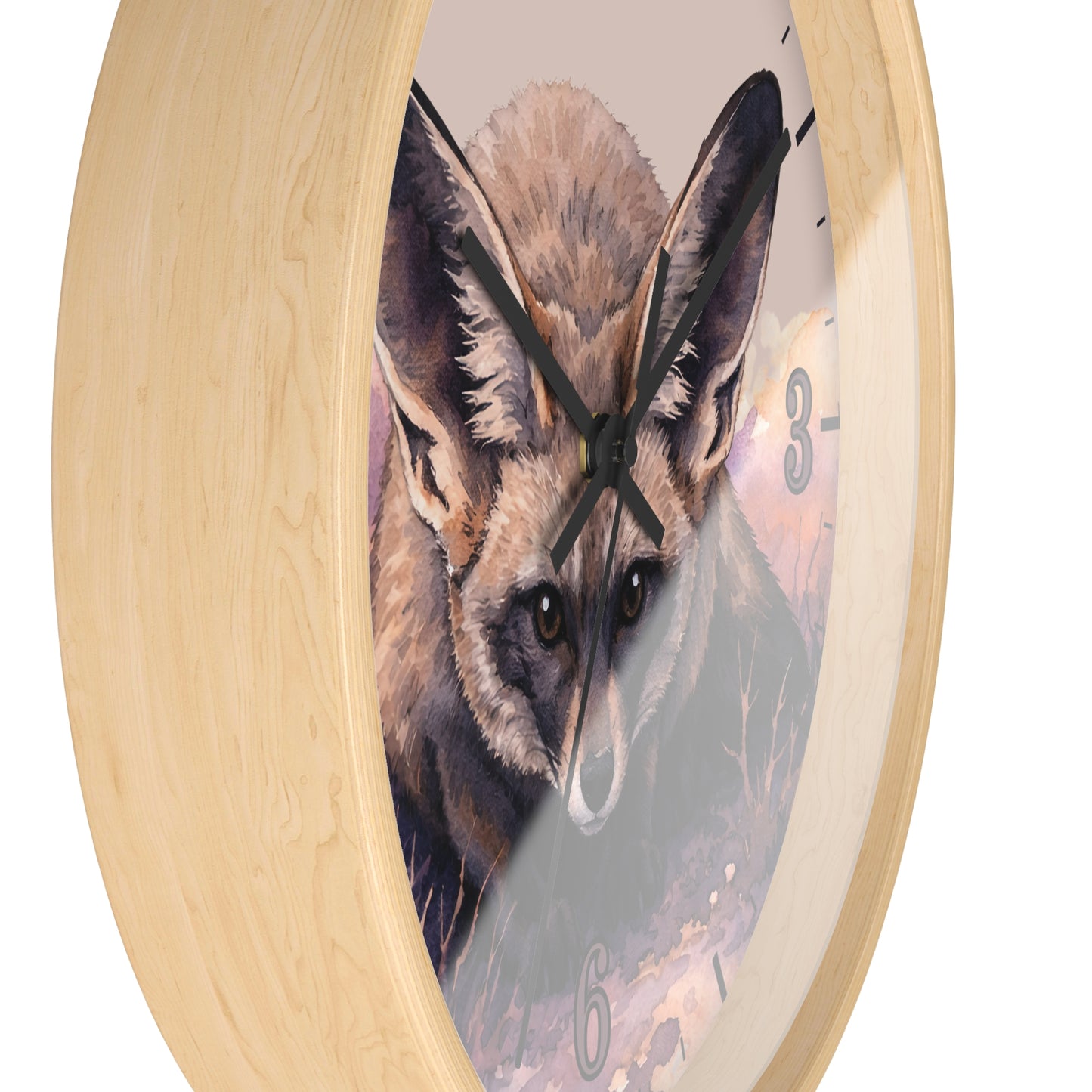 A round wall clock with a light natural wood frame and a printed fox illustration on the face, shown against a plain white background.