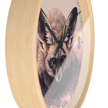 A round wall clock with a light natural wood frame and a printed fox illustration on the face, shown against a plain white background.