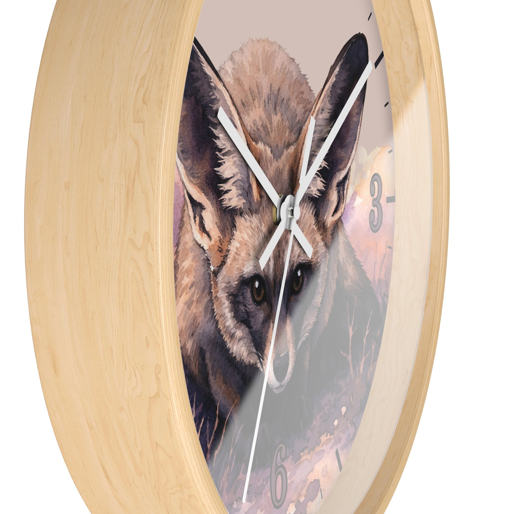 Round wall clock with a light natural wood frame and a printed fox face on the dial, shown against a plain white background.