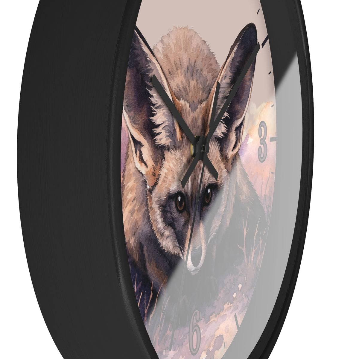 A round wall clock with a black frame and a printed illustration of a fox on the face, shown against a plain white background.