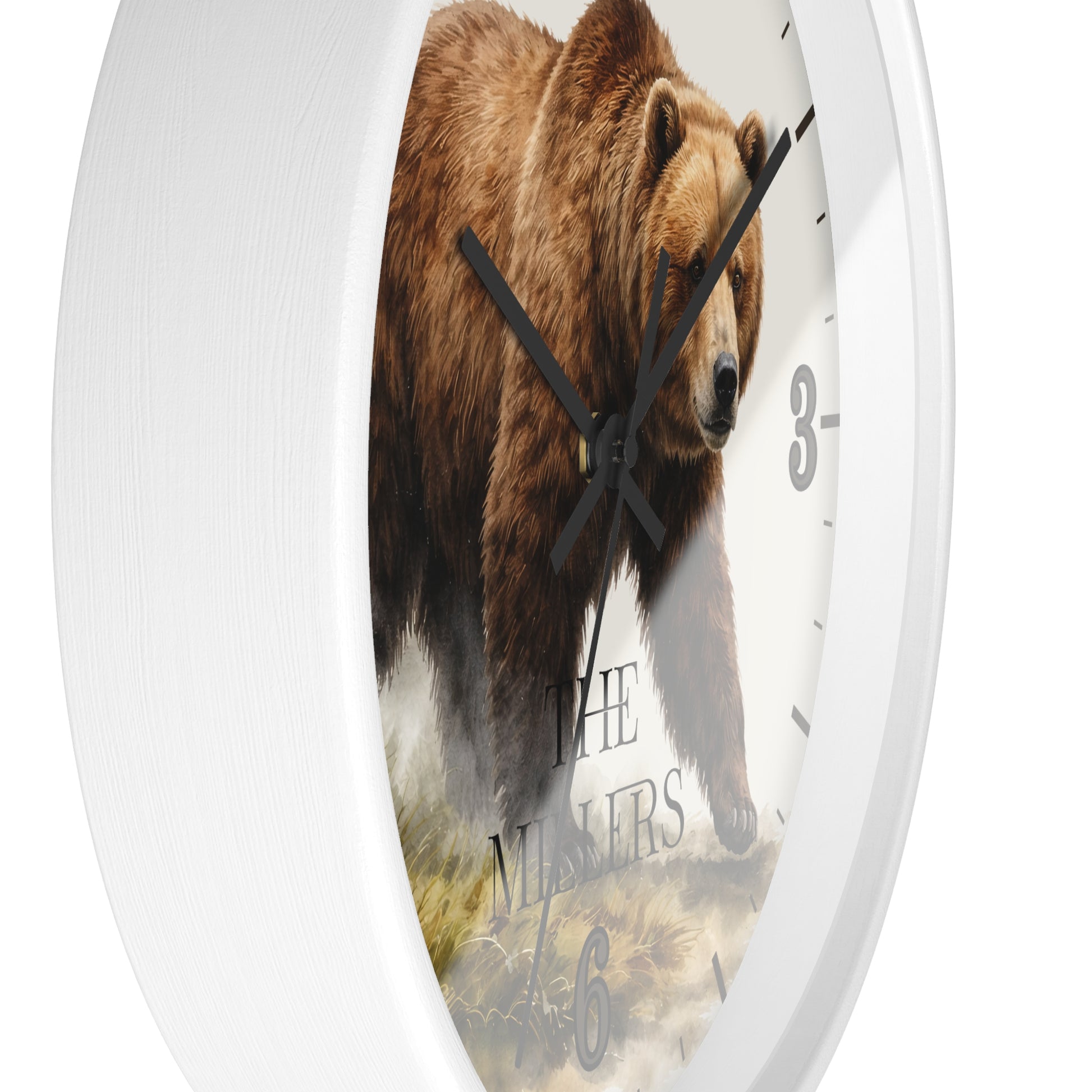 A white round wall clock featuring a large brown grizzly bear printed on the face, with black hands and partial black numerals. The words 'THE NINERS' are printed near the bottom.