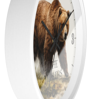 A white round wall clock featuring a large brown grizzly bear printed on the face, with black hands and partial black numerals. The words 'THE NINERS' are printed near the bottom.