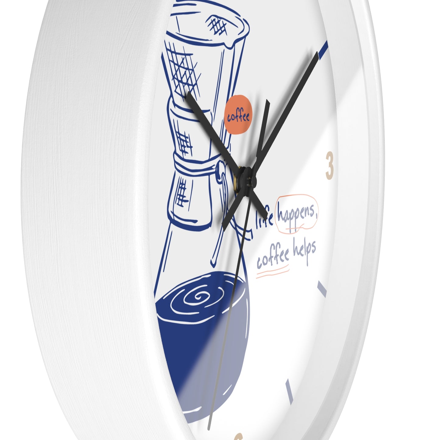 A white round wall clock with a coffee-themed illustration and text on the face. The design features a blue coffee cup and bean bag, a small orange circle with the word 'coffee', and the phrase 'life happens, coffee helps' in blue and orange script.