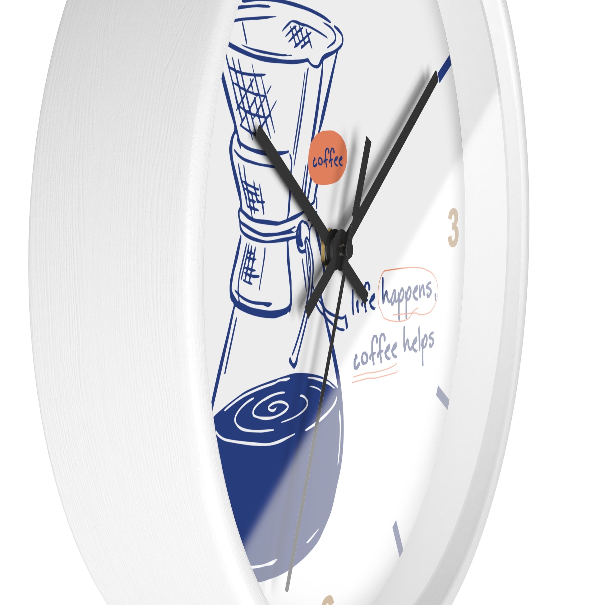 A white round wall clock with a coffee-themed illustration and text on the face. The design features a blue coffee cup and bean bag, a small orange circle with the word 'coffee', and the phrase 'life happens, coffee helps' in blue and orange script.
