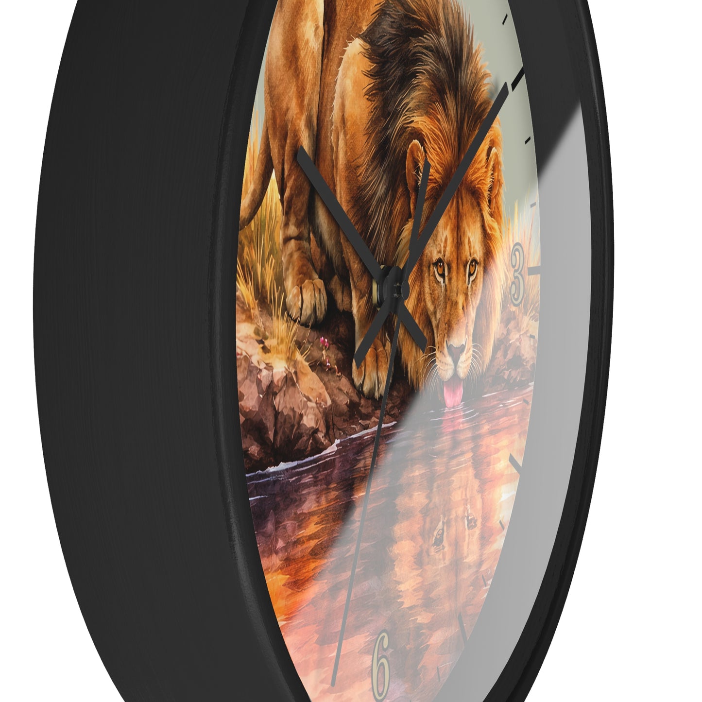 A round wall clock with a black frame and a printed lion drinking from water on the face, shown against a plain white background.