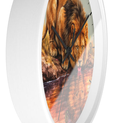 A white round wall clock with a printed lion and water scene on the face, shown against a plain white background.