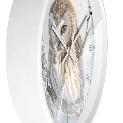 A round white wall clock featuring a detailed watercolor-style illustration of a brown owl with a yellow eye on the clock face, shown against a plain white background.