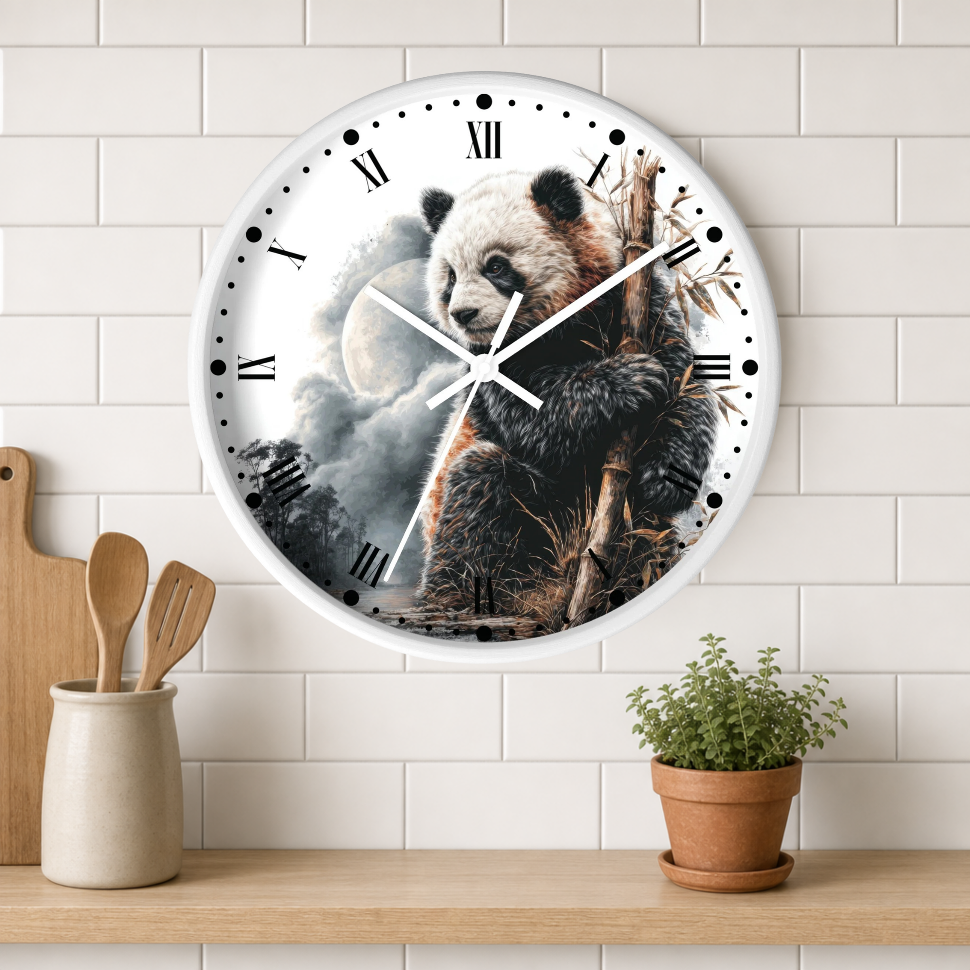 A round wall clock with a panda illustration hanging on a white subway-tile wall above a wooden shelf. The clock has a white frame, black Roman numerals, and white hands, with a printed panda holding bamboo against a cloudy sky background.