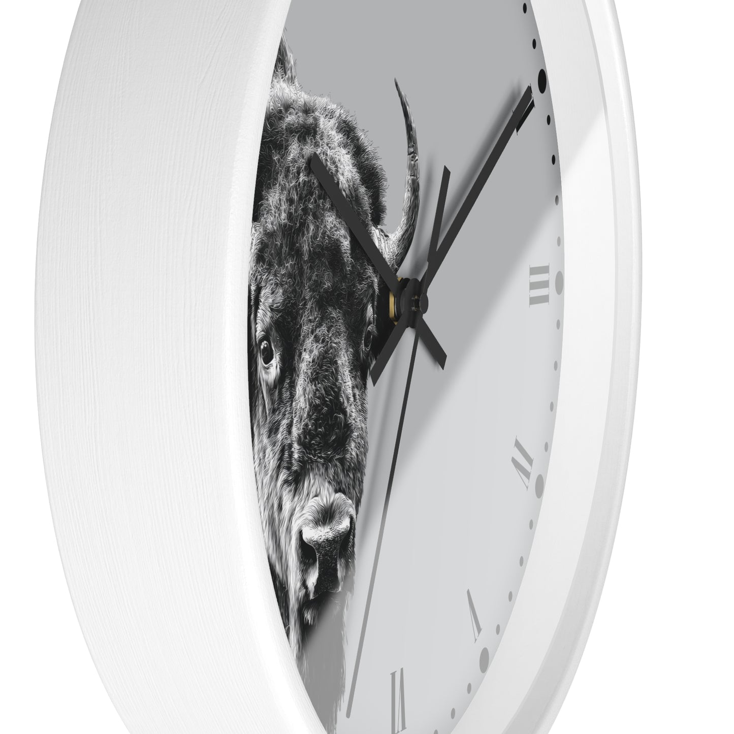 A white round wall clock with a black-and-white bull graphic printed across the face, shown against a plain white background.