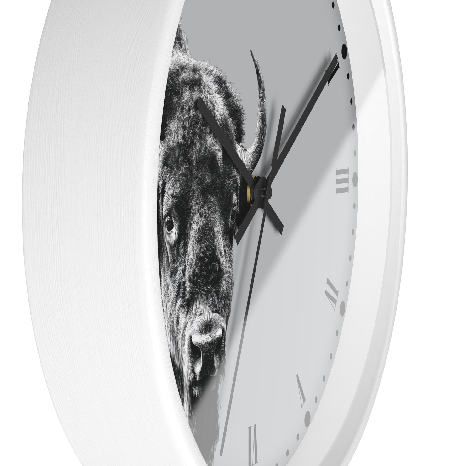 A white round wall clock with a black-and-white bull graphic printed across the face, shown against a plain white background.