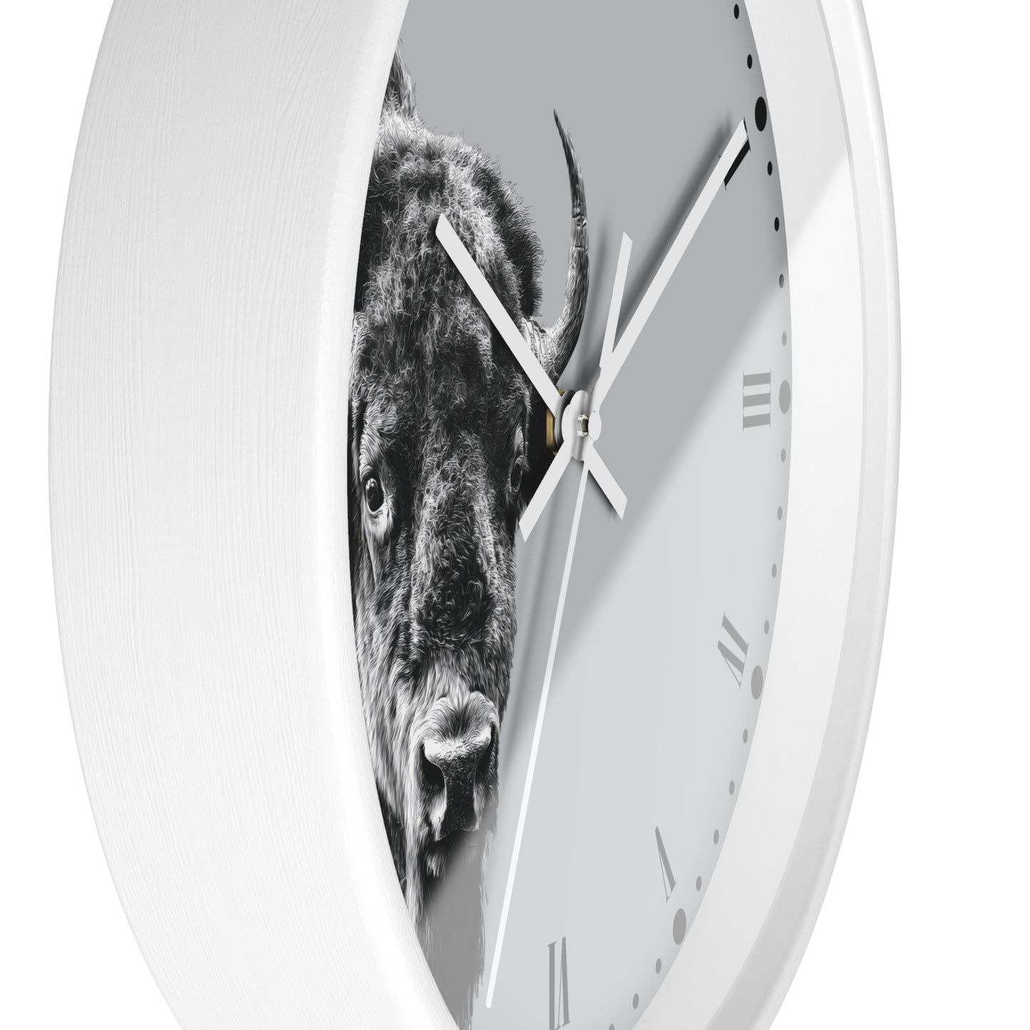 A white round wall clock with a black-and-white photographic print of a bison on the face, shown against a plain white background.