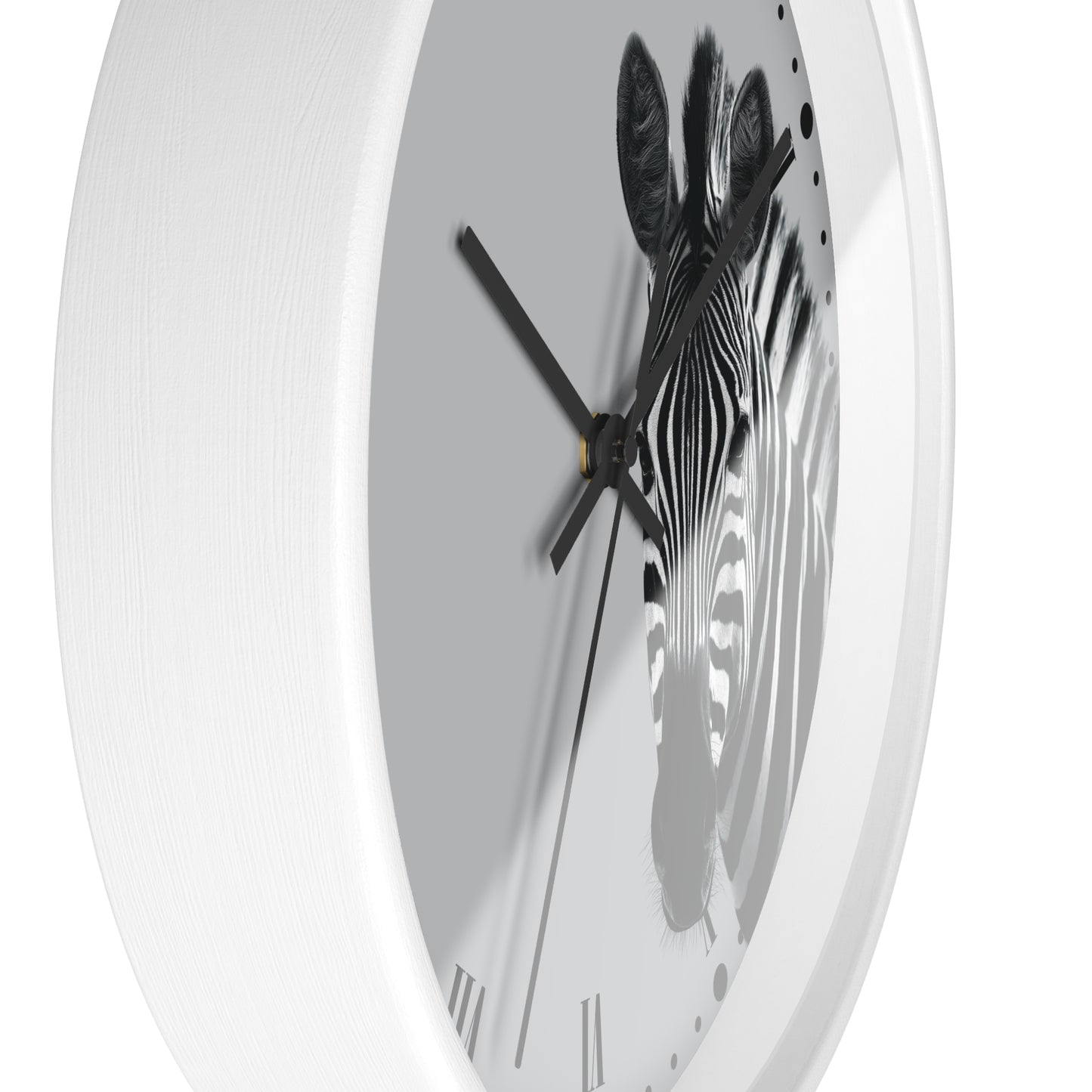 A white round wall clock with a black and white zebra print on the face and black hands, shown against a plain white background.