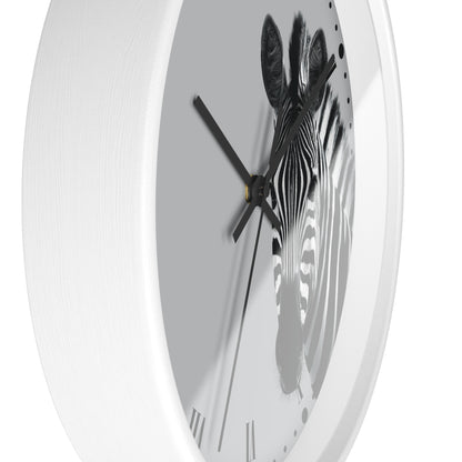 A white round wall clock with a black and white zebra print on the face and black hands, shown against a plain white background.