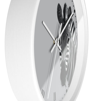 A white round wall clock with a grayscale zebra print on the face and white hands, shown against a plain white background.
