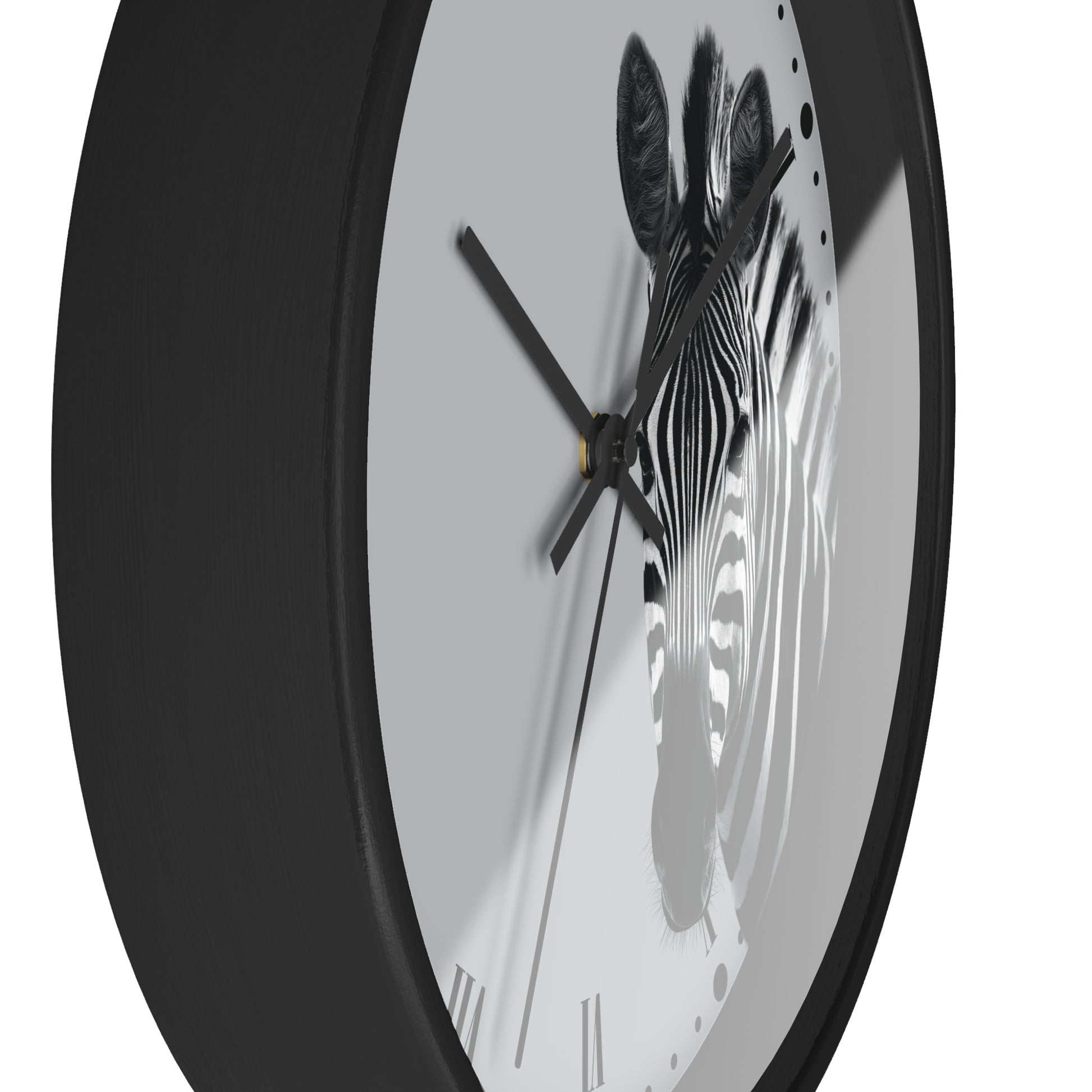 Round wall clock with a black frame and a minimalist zebra face design on a light gray dial, shown against a white background.