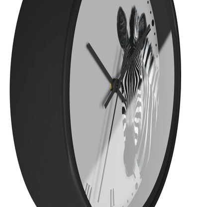 Round wall clock with a black frame and a minimalist zebra face design on a light gray dial, shown against a white background.