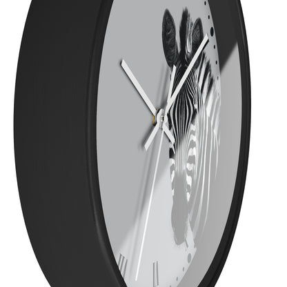 A round wall clock with a black frame and a minimalist face featuring a black-and-white zebra illustration on a light gray background.
